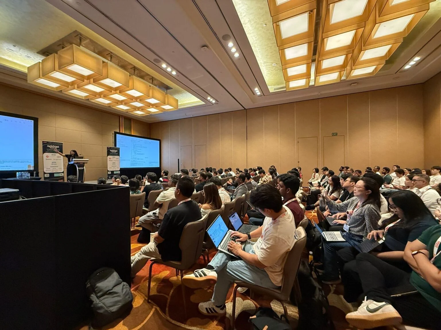 Developer workshop at Marina Bay Sands Singapore with Postman Agent Mode and MCP live demo on screen