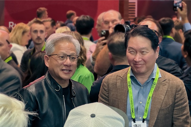 SK Group Chairman Chey Tae-won and NVIDIA CEO Jensen Huang at GTC Taipei 2026 keynote